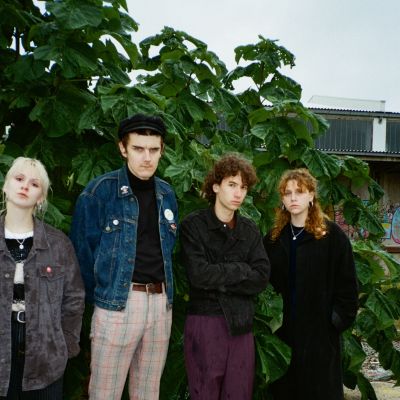 Laundromat Chicks Band Pic infront of trees